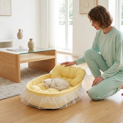 lit pour chat ovale jaune chat humain