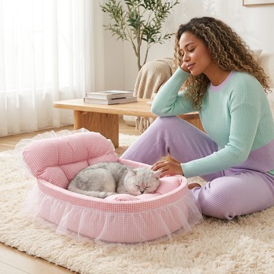 lit pour chat ovale rose humain chat endormi 